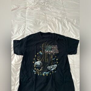 Lynyrd Skynyrd band tee shirt.